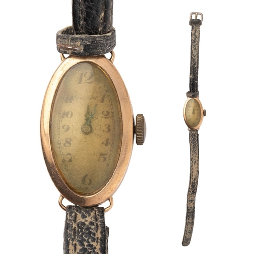 51 - A 9ct yellow gold ladies watch on a leather strap. Gross weight 11.4g.