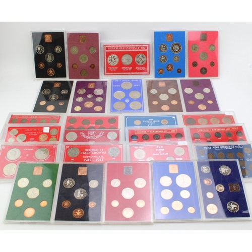 101 - A large collection of UK cased coin sets to include Royal Mint examples such as 1980, 1974, 1973, 19... 