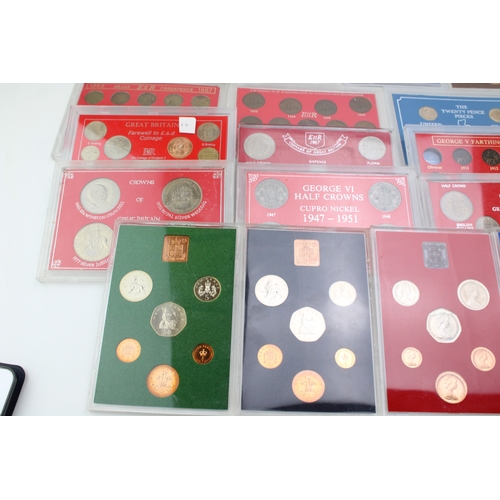 101 - A large collection of UK cased coin sets to include Royal Mint examples such as 1980, 1974, 1973, 19... 