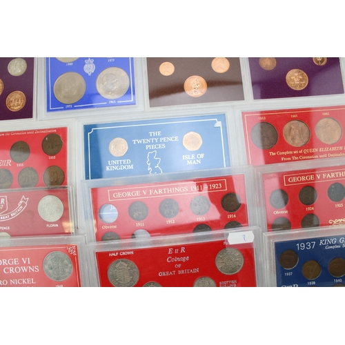 101 - A large collection of UK cased coin sets to include Royal Mint examples such as 1980, 1974, 1973, 19... 