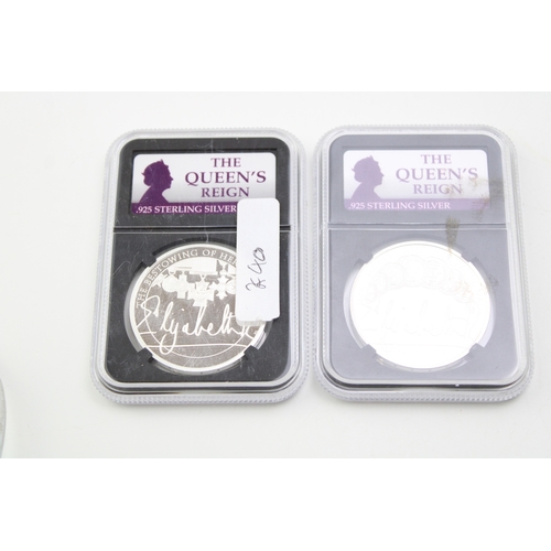 108 - The Queen's Reign Sterling Silver Royal Mint silver £5 coins, each weighing 28.28g (2).