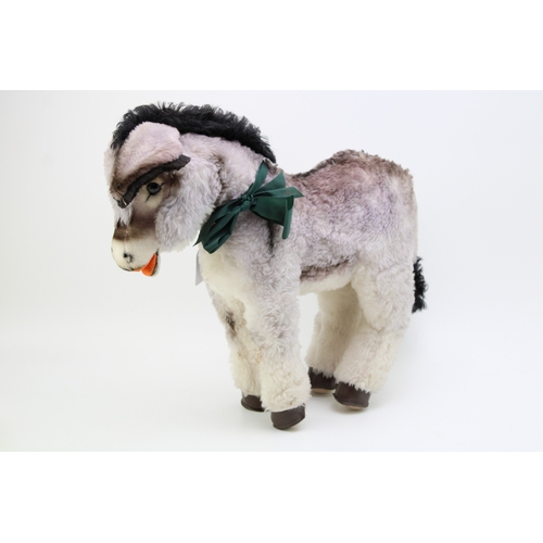 1129 - A Steiff Donkey, medium size. Stud to left ear, (ribbon missing). Height 39cm.