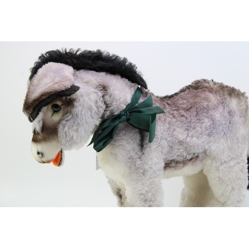 1129 - A Steiff Donkey, medium size. Stud to left ear, (ribbon missing). Height 39cm.