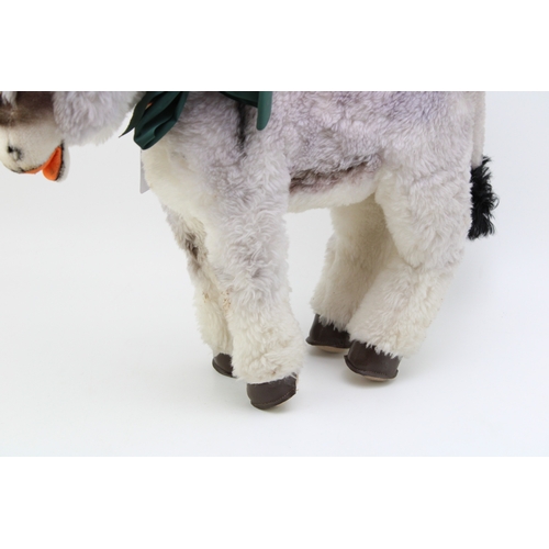 1129 - A Steiff Donkey, medium size. Stud to left ear, (ribbon missing). Height 39cm.