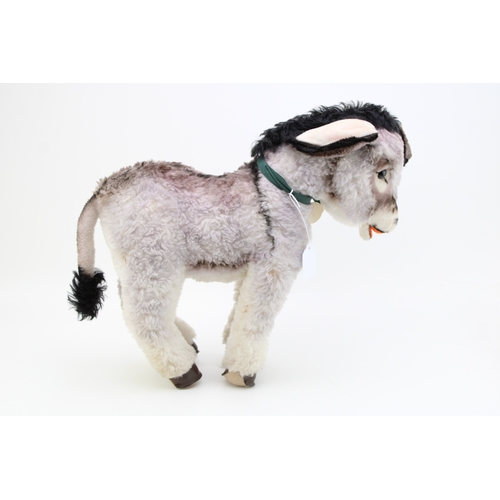 1129 - A Steiff Donkey, medium size. Stud to left ear, (ribbon missing). Height 39cm.