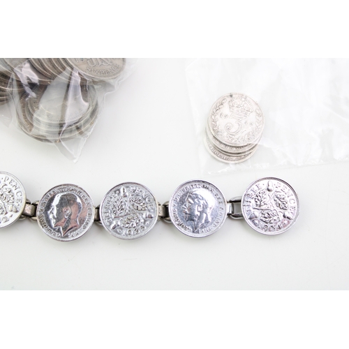 113 - A collection of silver and half silver coins to include silver 3d pieces (5.5g), half silver mixed U... 