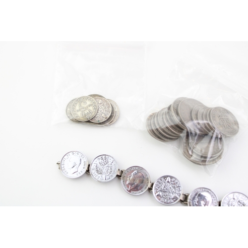 113 - A collection of silver and half silver coins to include silver 3d pieces (5.5g), half silver mixed U... 