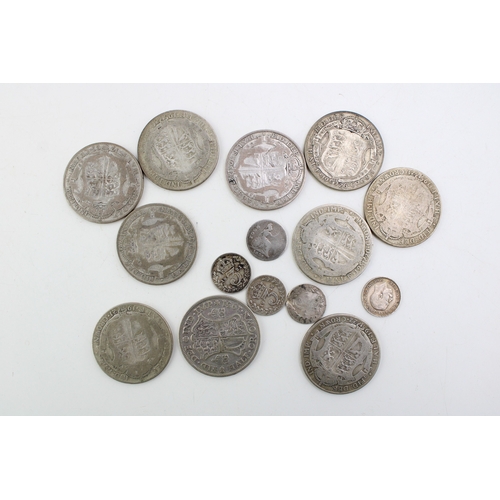 114 - A collection of UK silver coinage to include ten 1/2 crowns, (136.2g) together with four pre 1920 3d... 