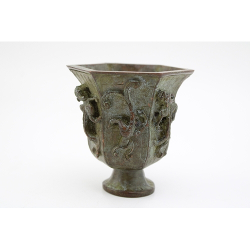 1149 - Reproduction bronze oriental style vase with stylised dragons in relief