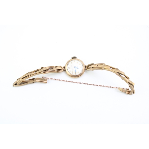 12 - A lady's 9ct gold cased Rotary cocktail watch, with 9ct gold expandable bracelet strap, the signed d... 