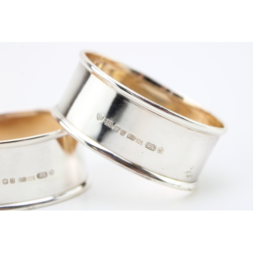 120 - A pair of rare Welsh hallmarked silver napkin rings of oval form, Ari D Norman, 1988, with marks for... 