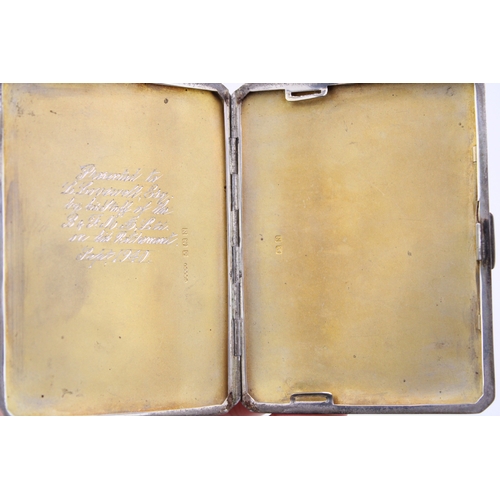 121 - A silver cigarette case with engine turned decoration, hallmarked Birmingham. Weight 172.5g.