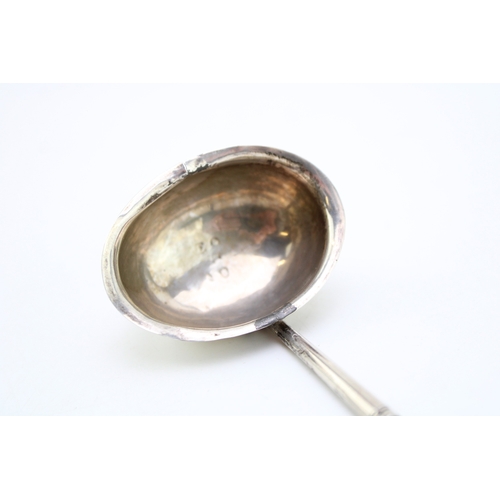 124 - A George III silver toddy ladle, of small size with simple oval bowl, and baleen twist handle, maker... 