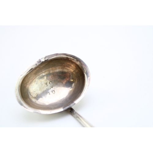 124 - A George III silver toddy ladle, of small size with simple oval bowl, and baleen twist handle, maker... 