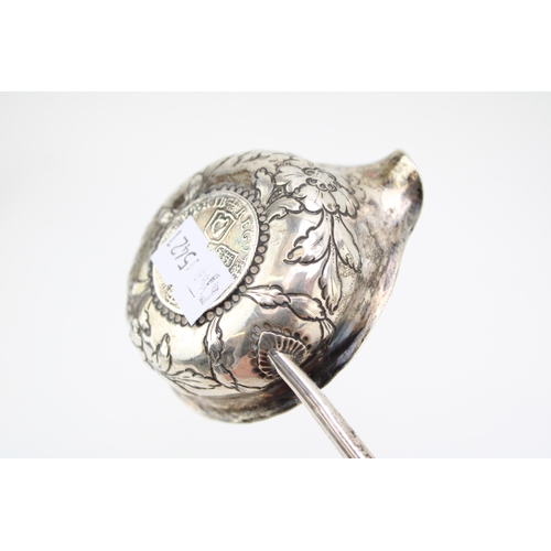 128 - A silver toddy ladle, likely 18th century with Queen Anne half crown inset, the bowl with rococo cha... 