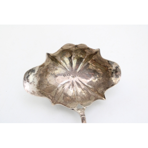 131 - A George III silver toddy ladle with double pouring bowl, of shell form, hallmarked to the bowl, mak... 