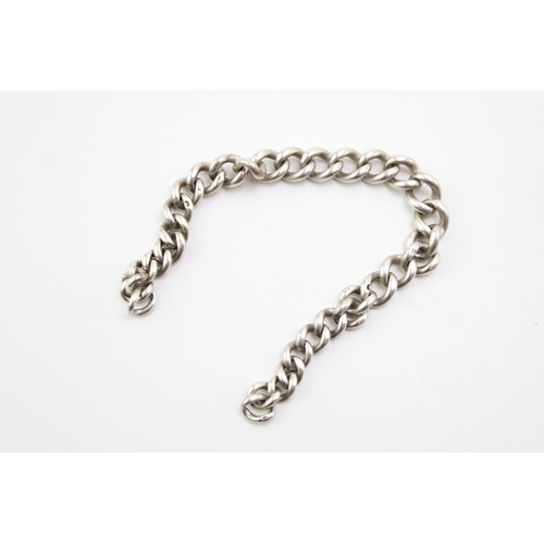 137 - A silver Albert graduated watch chain, each link hallmarked. Length 19cm. Weight 21g