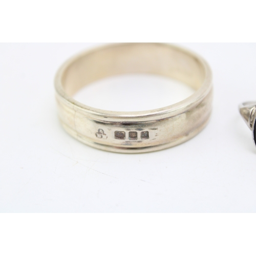 144 - A heavy silver serviette ring (33.9g) hallmarked London 1959 together with a silver Wedgwood Jasperw... 