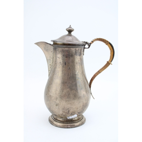 147 - A late Victorian silver hot water jug, hallmarked London 1897. Weight 554g