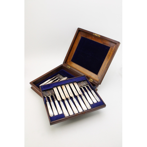 150 - A cased set of Victorian mother of pearl handled silver cutlery, to include twelve knives and twelve... 