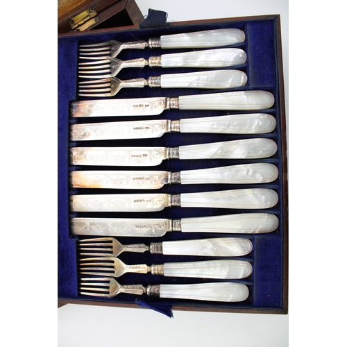 150 - A cased set of Victorian mother of pearl handled silver cutlery, to include twelve knives and twelve... 