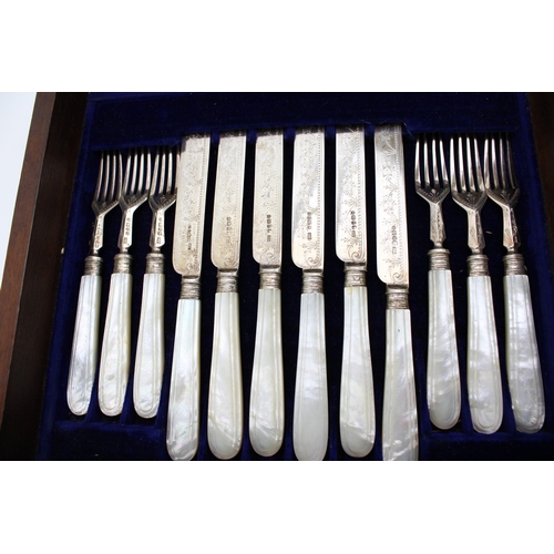 150 - A cased set of Victorian mother of pearl handled silver cutlery, to include twelve knives and twelve... 