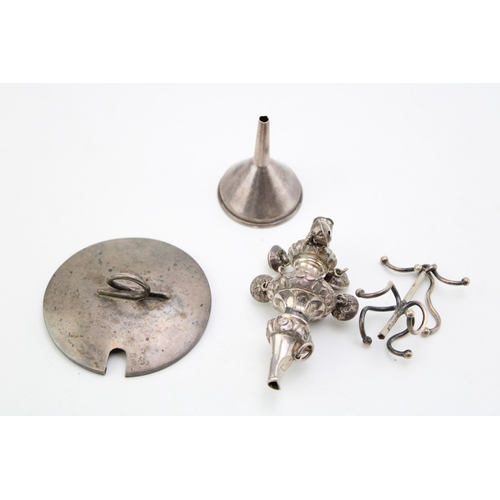 155 - A mixed collection of silver items to include a babies rattle a/f a silver hip flask funnel and othe... 