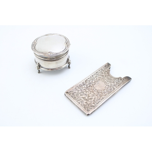 159 - A silver silk lined ring box with filled base raised on three Queen Anne style legs together with a ... 