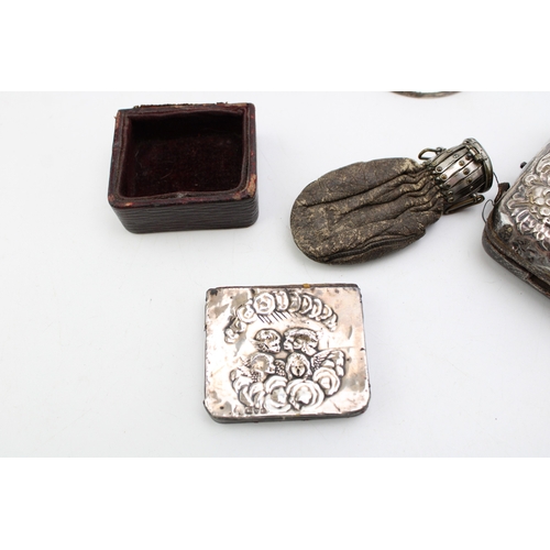 162 - A collection of silver and silver plated items to include antique silver picture frame, lidded box a... 