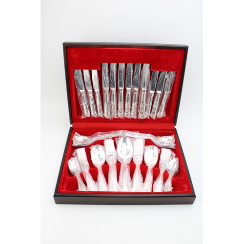 164 - A vintage boxed canteen of silver plated cutlery with Sheffield stainless steel blades.