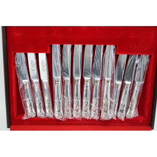 164 - A vintage boxed canteen of silver plated cutlery with Sheffield stainless steel blades.