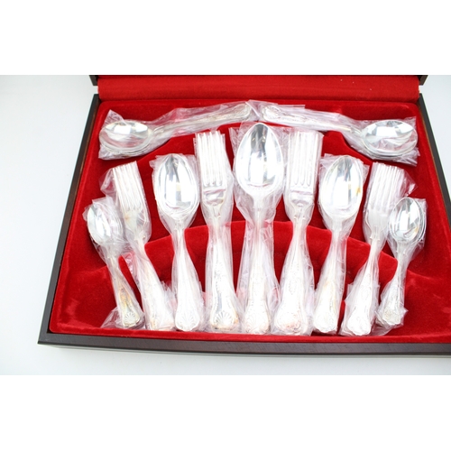 164 - A vintage boxed canteen of silver plated cutlery with Sheffield stainless steel blades.