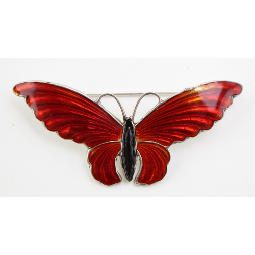 177 - Contemporary silver and enamel brooch in the form of a butterfly, wings spread, 5cm wide.