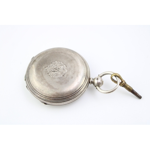 18 - Silver full hunter pocket watch, Chester 1875, winds and runs, 54mm wide.