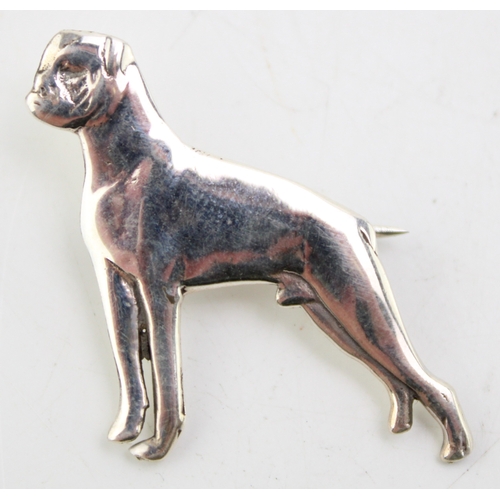 180 - Contemporary silver brooch in the form of a boxer dog, 3cm tall.