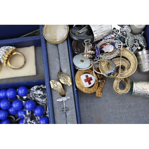 201 - Two vintage jewellery boxes with contents, including various silver thimbles, silver jewellery, a ja... 