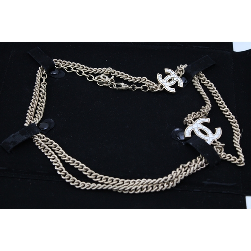 208 - A Chanel necklace, of rope textured curb links, with interlocking C logo at intervals, in two tone w... 