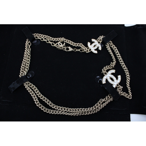 208 - A Chanel necklace, of rope textured curb links, with interlocking C logo at intervals, in two tone w... 