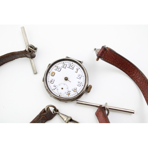 21 - A silver 925 cased trench style watch, missing hands, with two later leather albert chains (3).