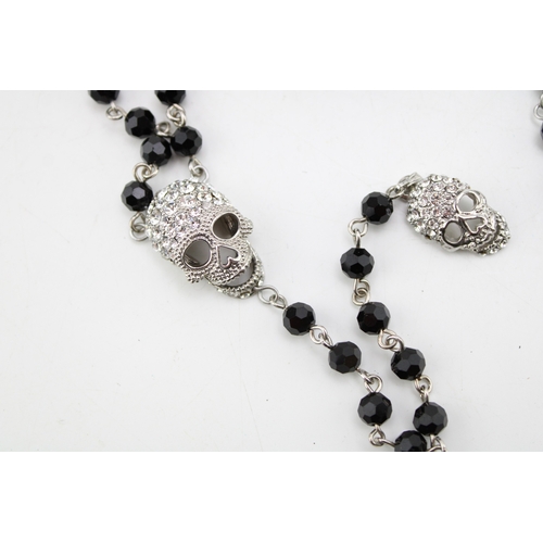 219 - Vintage Designer Jewellery: a Butler and Wilson diamante skull and faceted black bead necklace and m... 