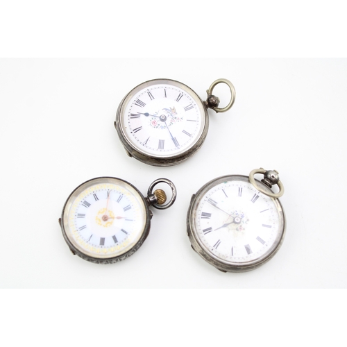 22 - Three lady's silver fob watches, ornate decoration, one .935 silver and two .800 examples, all untes... 