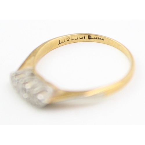 238 - 18ct gold and platinum diamond ring, with three illusion-set diamonds, 1.7g, size M.