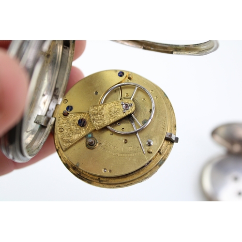 24 - Two silver pocket watches, yellow metal coloured numerals, both key wind, largest 54mm (2), both unt... 