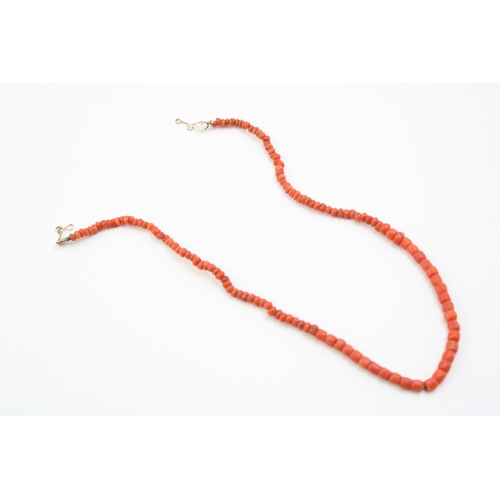 270 - A vintage coral necklace of graduated naturalistic form, 40cm long, 13.1g.