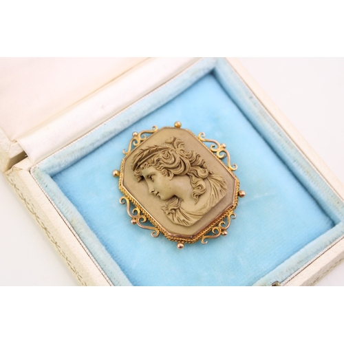 282 - An Italian lava ware cameo bust of a classical female in 9ct gold brooch scroll and bead mount, 41.7... 