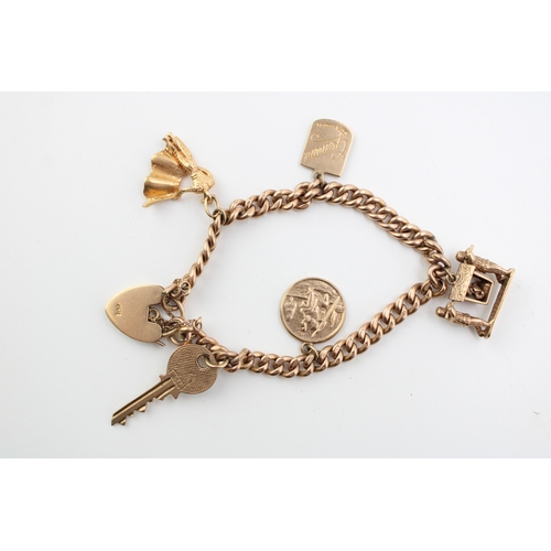 284 - A 9ct gold curb link charm bracelet with heart shaped padlock clasp and five charms, comprising a to... 