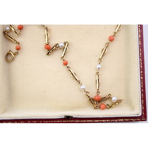 285 - A child's 9ct gold, seed pearl and coral necklace, possibly Victorian, 37cm long, 6.3g.