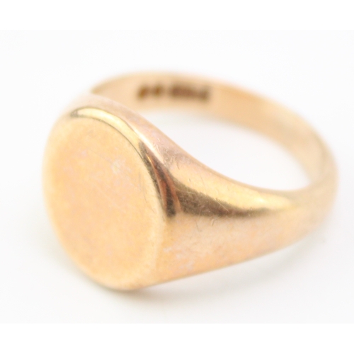 290 - A 9ct gold signet ring, the circular face blank, size T/U, 11.3g.