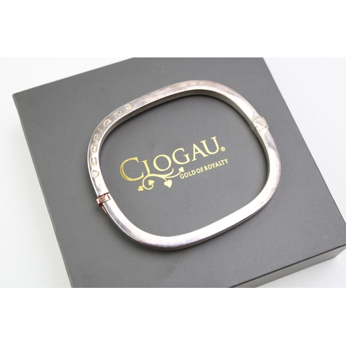 302 - Clogau Welsh silver 'Cariad' bangle, 35.9g, in Clogau box.