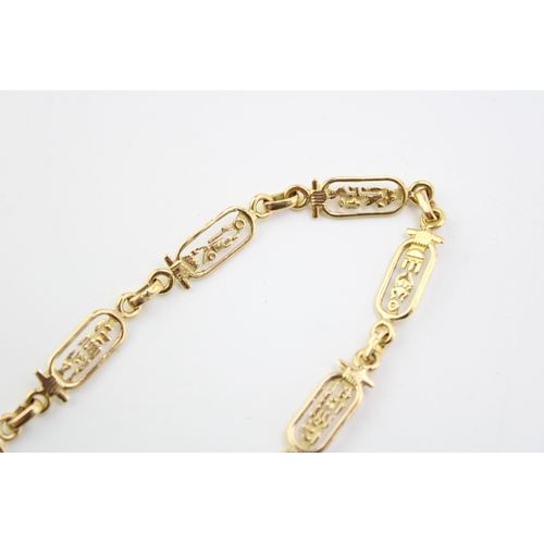 306 - A 14ct yellow gold Egyptian bracelet with Scarab Beatle and Hieroglyphs design 19cm. Weight 6.0g